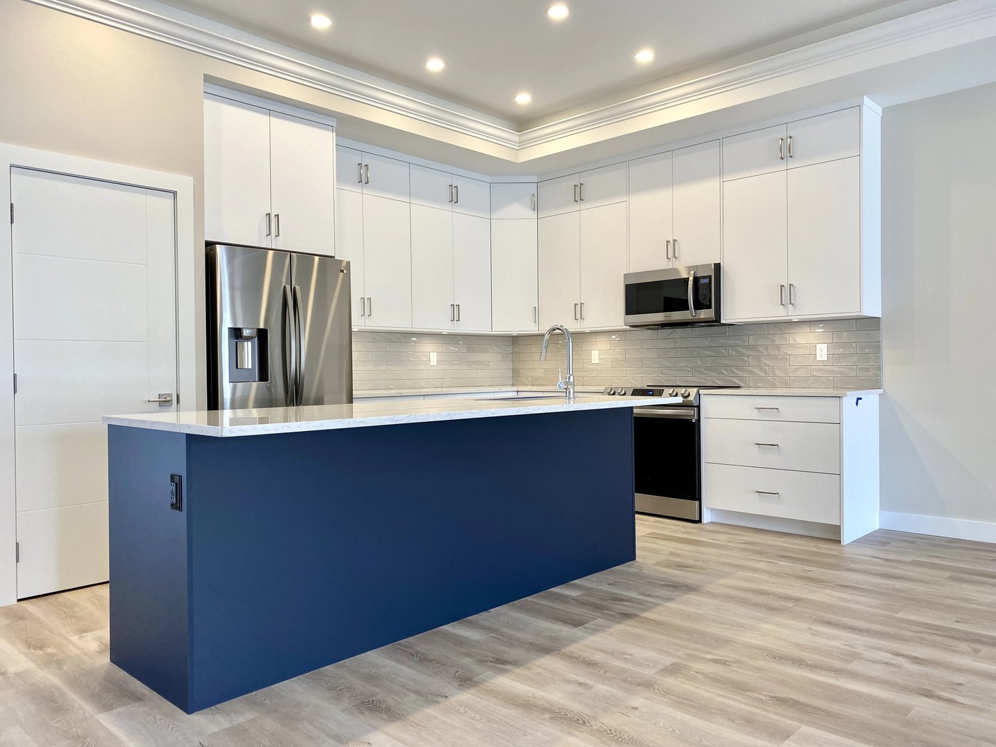 Completed kitchen with navy island